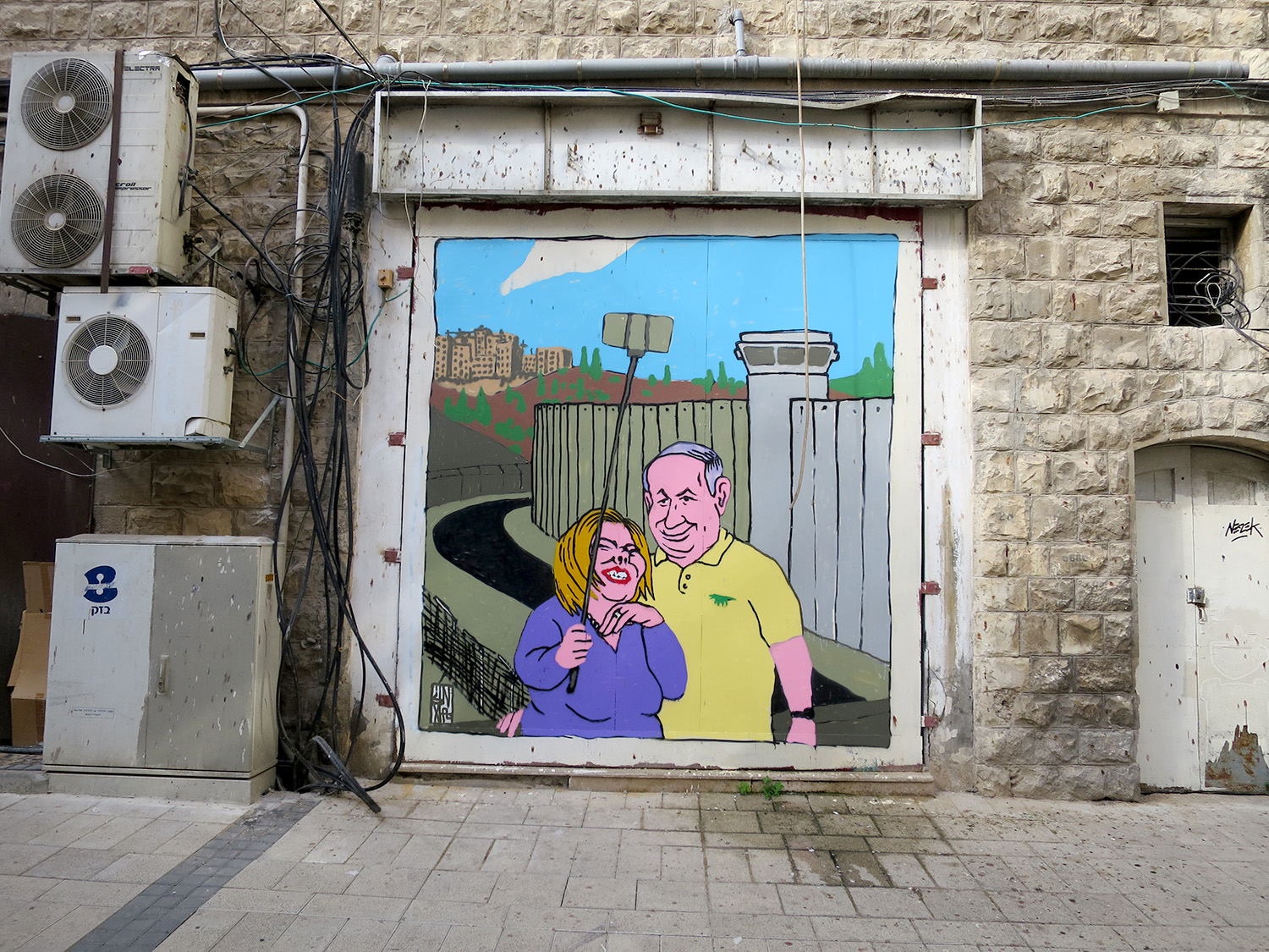 broken fingaz unga graffiti israel gaza occupation peace separation wall  selfie stick haifa  street art