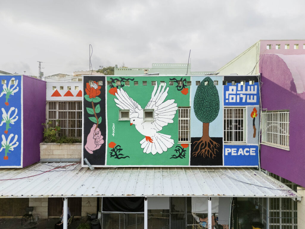 mural wall Peki’in tant broken fingaz Druze Arab Upper Galilee street art graffiti arabic hebrew peace